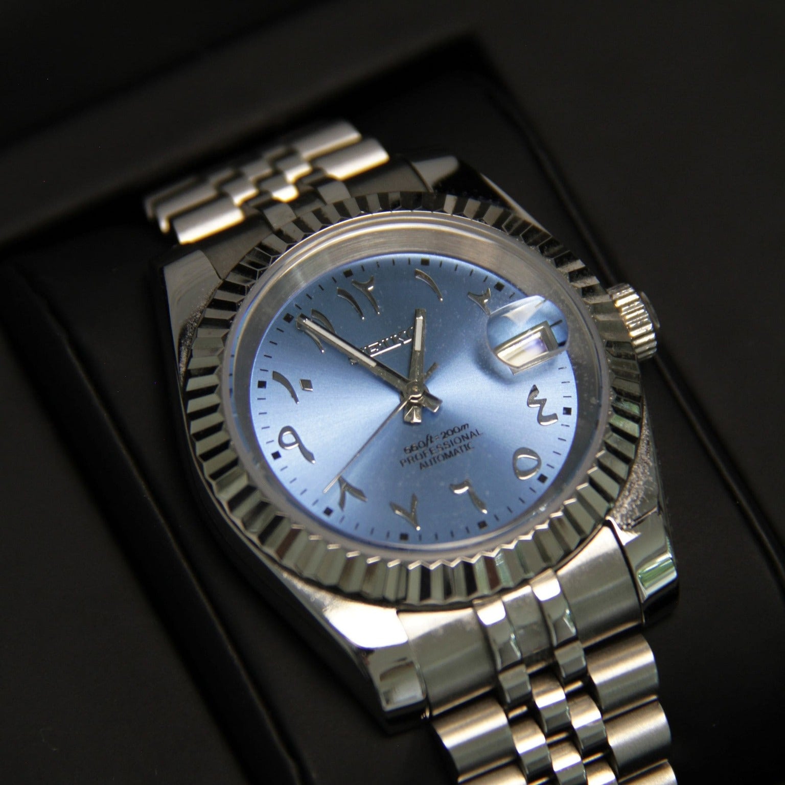 Three quarter wrist view of Seiko Mod Datejust Ice Blue Arabic dial with raised Arabic numerals