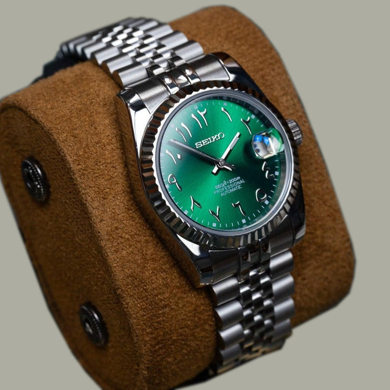 Seiko Mod Datejust Royal Green Arabic left angle close up on brown cushion
