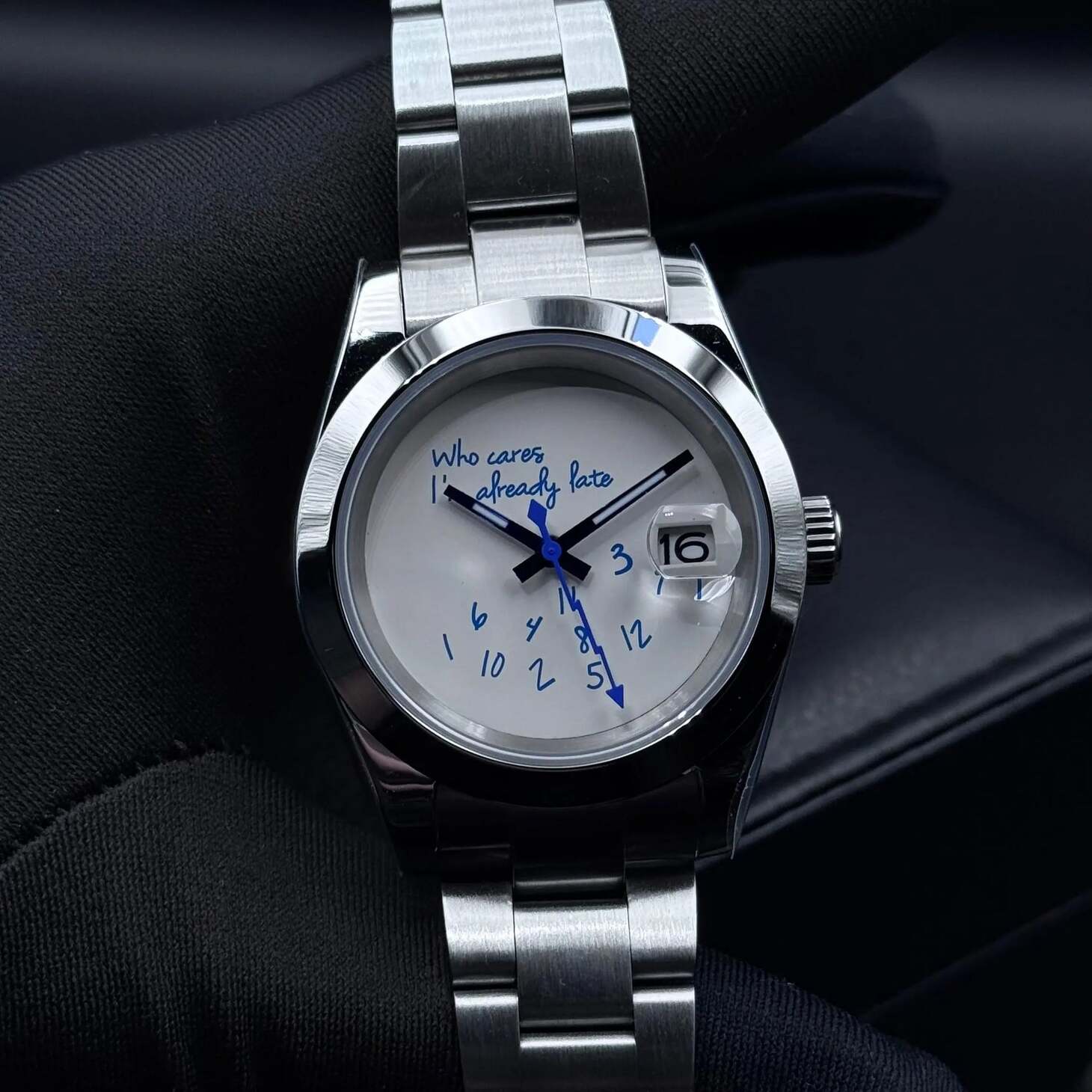 Seiko Mod Datejust Who Cares Smooth Bezel front view on black background showing white dial