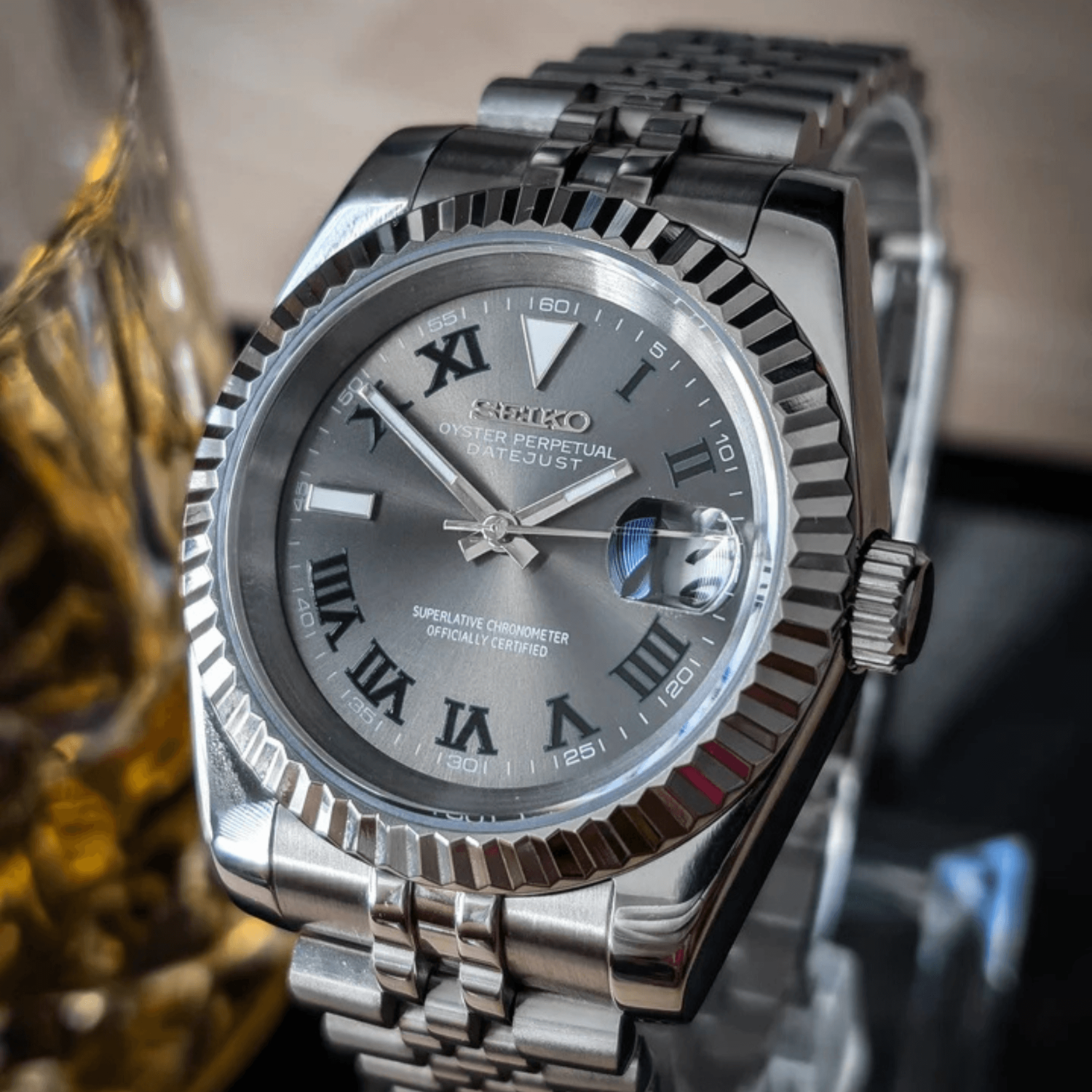 Right three quarter angle of Seiko Mod Datejust Wimbledon highlighting the green Roman numerals under soft light.