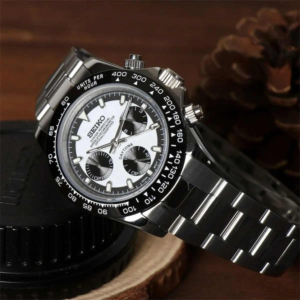 Seiko Mod Daytona in Black White, angled view showcasing panda dial, ceramic bezel and steel bracelet