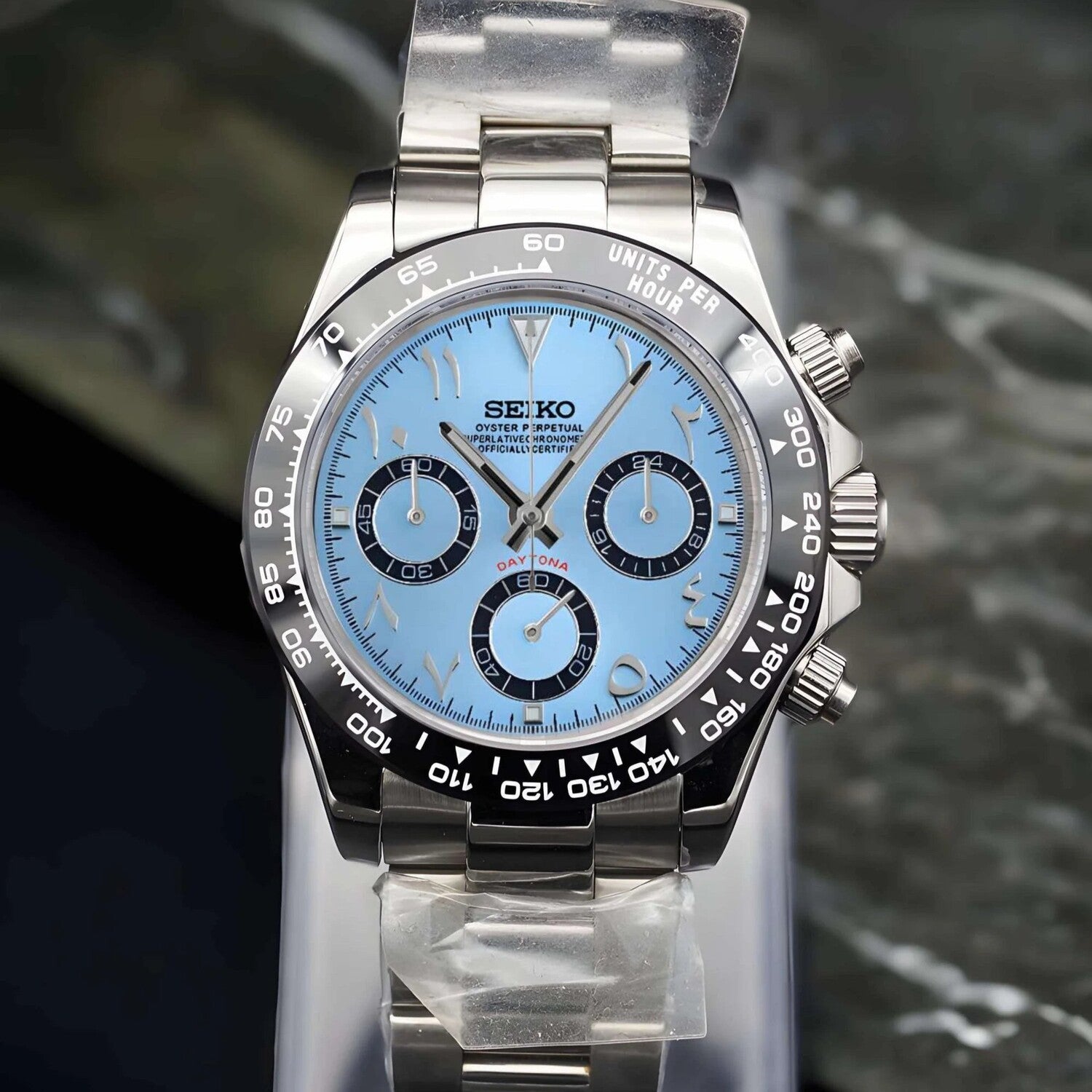front view of Seiko Mod Daytona ice blue Arabic dial, mounted on stainless steel bracelet.