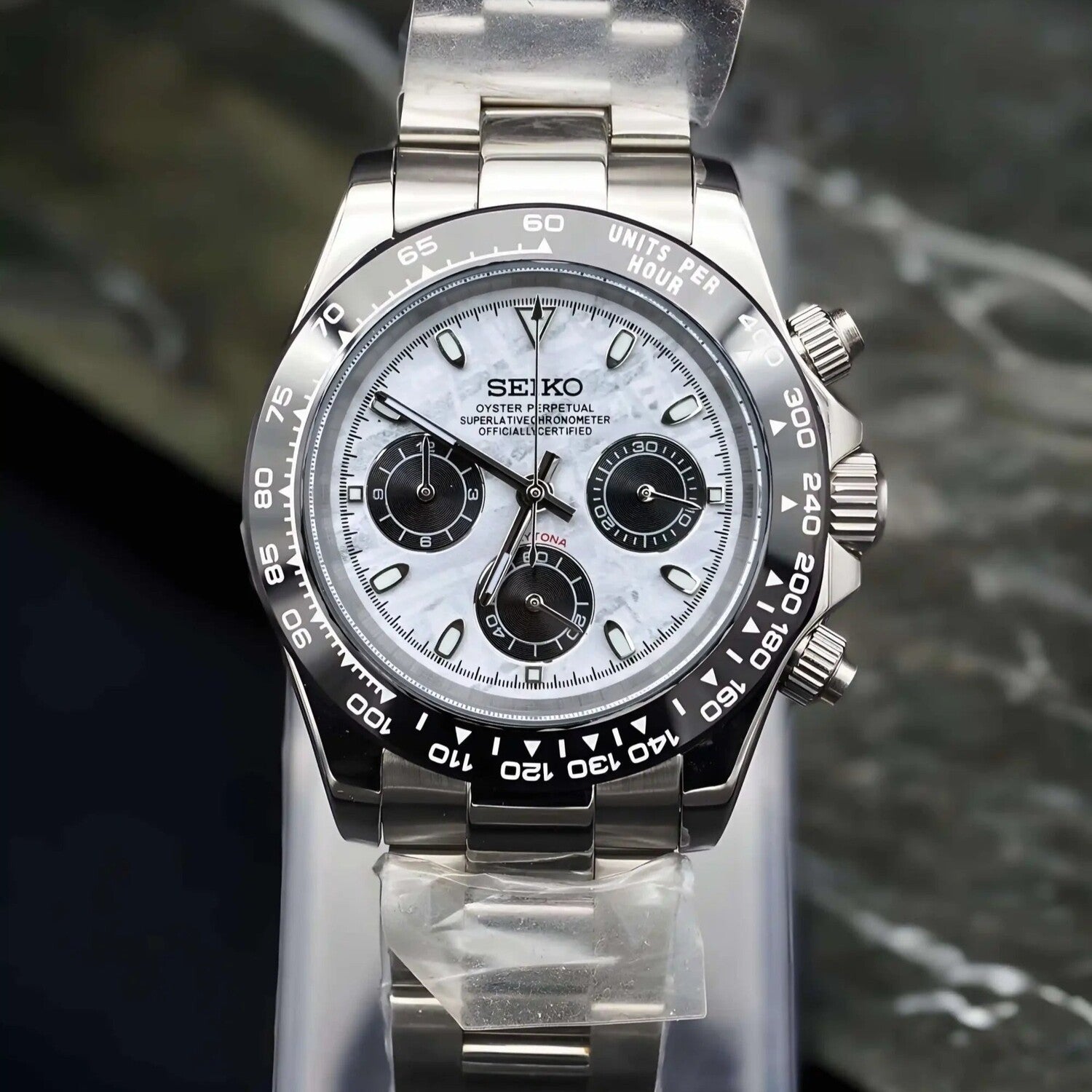 Front view of Seiko Mod Daytona meteorite dial on stainless steel bracelet, shown in a vertical display position.