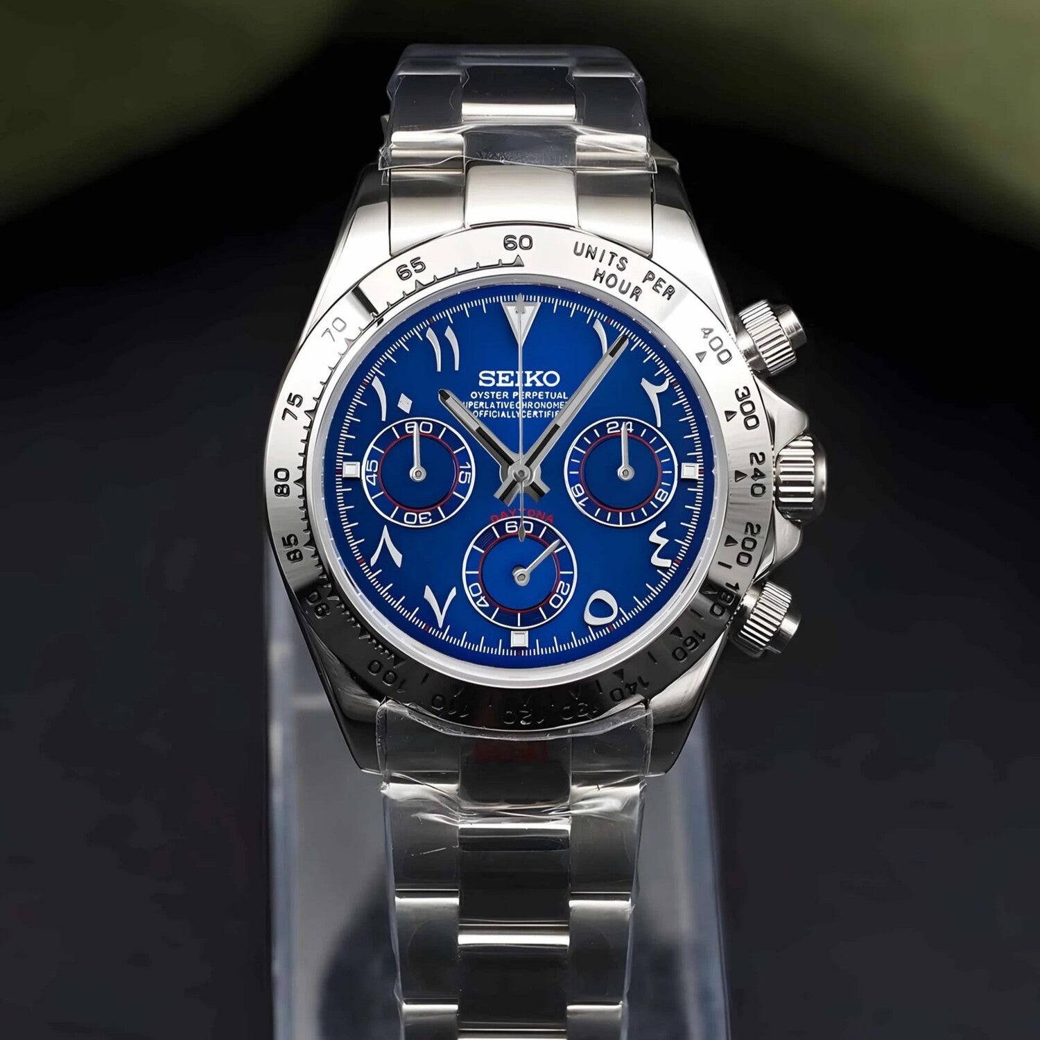 Seiko Mod Daytona Royal Blue Arabic front view featuring deep blue dial, Arabic numerals, silver bezel, and stainless steel bracelet.