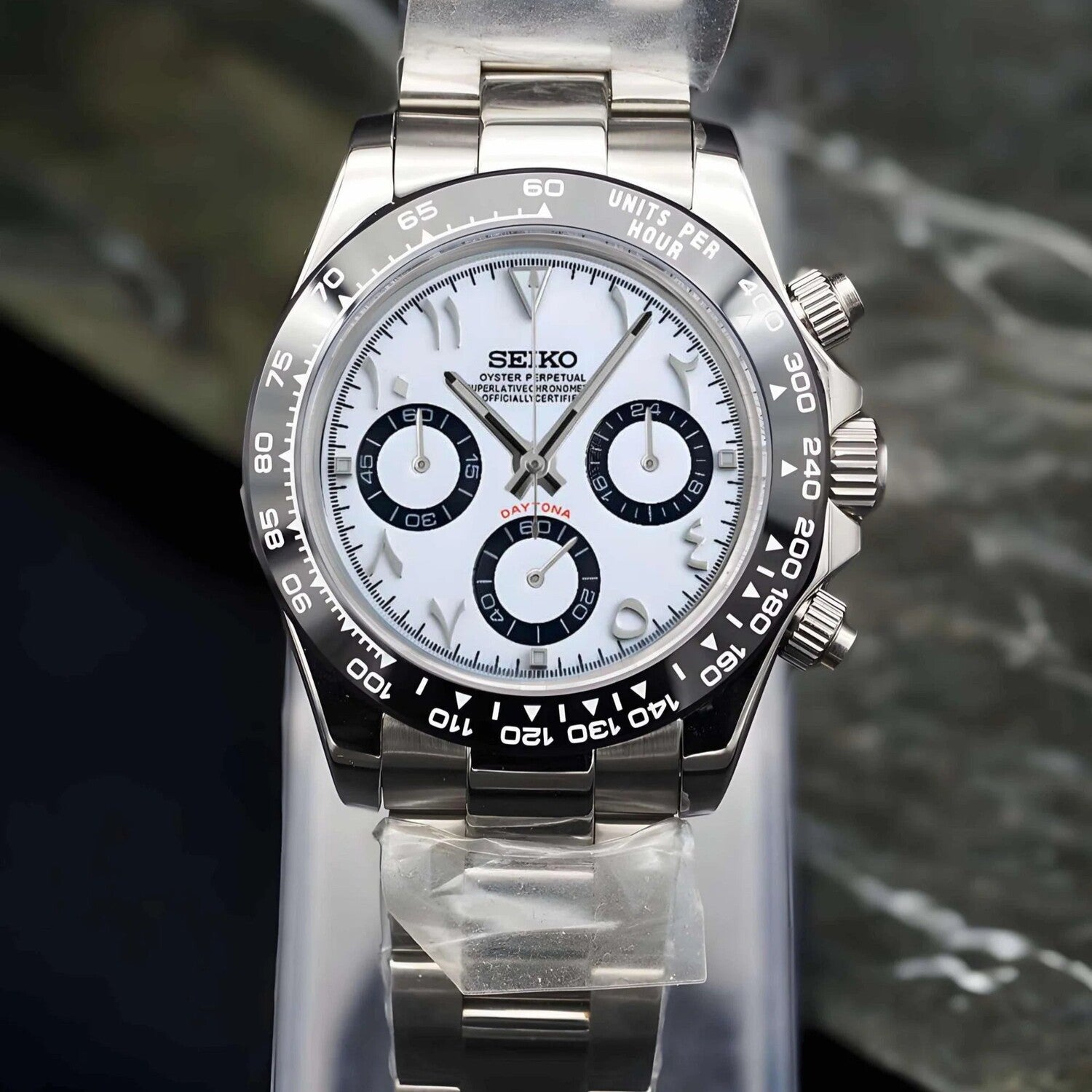 Seiko Mod Daytona front view white Arabic dial with stainless steel bracelet and black ceramic bezel