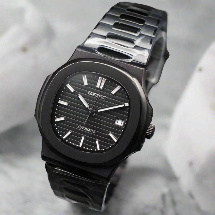Right angle Seiko Mod Nautilus All Black showcasing polished edges and crown detail