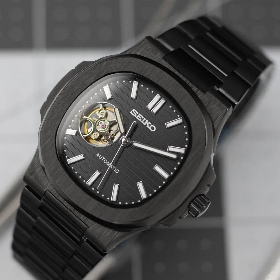 Top view Seiko Mod Nautilus All Black Open Heart displaying integrated bracelet and clean geometry