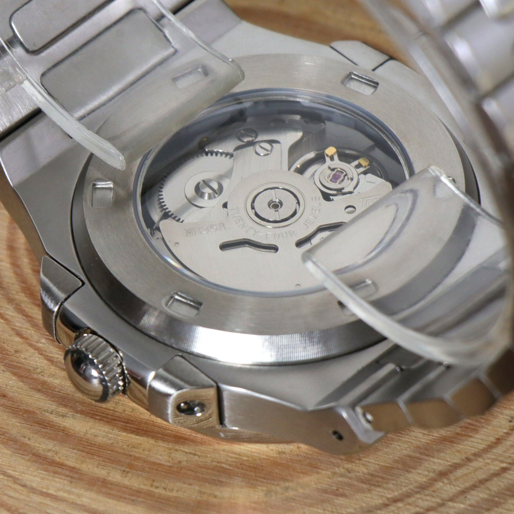 Transparent case back of Seiko mod Nautilus olive green open heart showing automatic movement