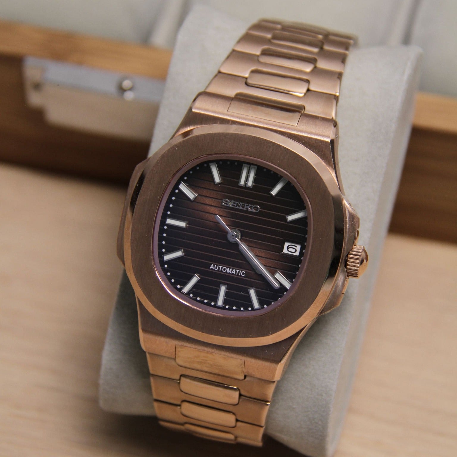 Angled front view Seiko Mod Nautilus Chocolate focusing on dial texture and warm rose tone
