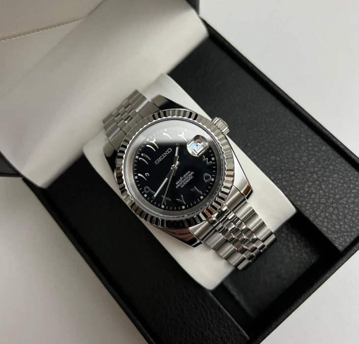 Top view of Seiko Mod Datejust Black Arabic with Arabic numerals and silver jubilee bracelet