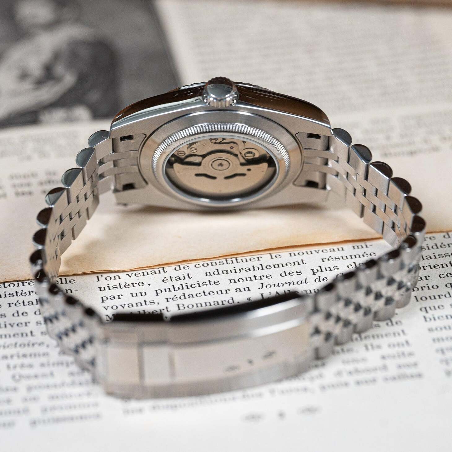 Rear view of Seiko Mod Datejust Cosmos Arabic showing NH35 automatic movement through sapphire caseback