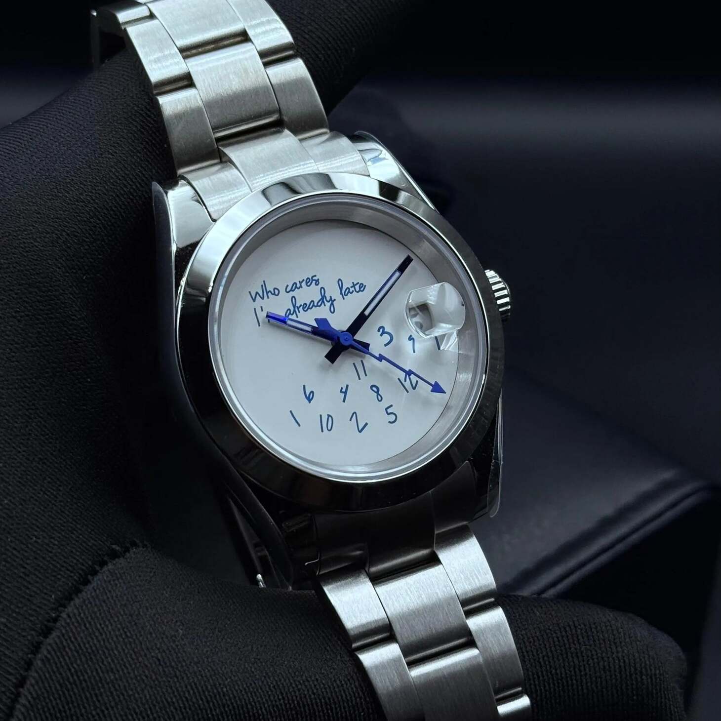 Seiko Mod Datejust Who Cares Smooth Bezel left angled view showing playful dial layout