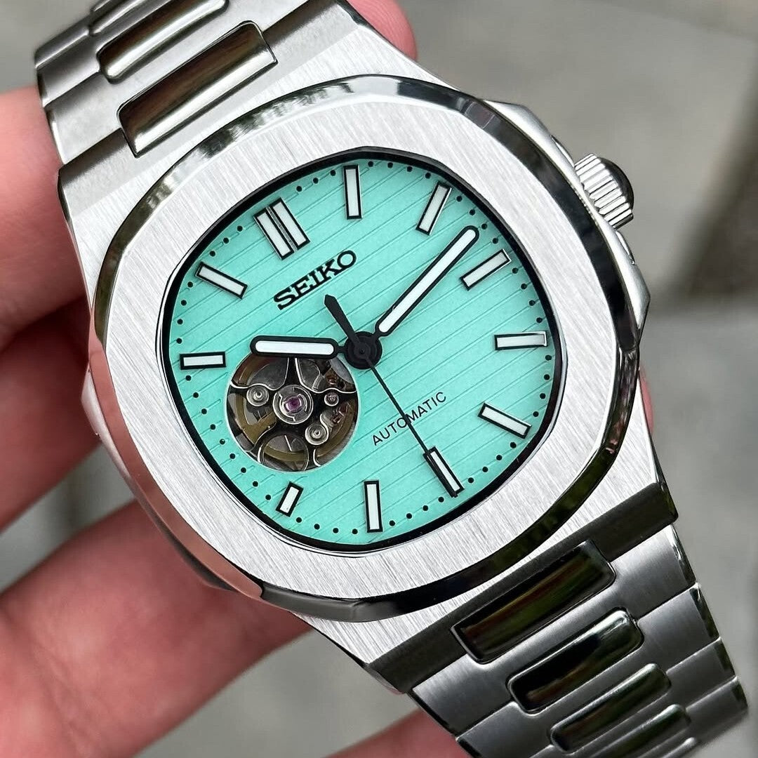 Close-up front view Seiko Mod Nautilus Tiffany Open Heart emphasizing vibrant dial and open balance wheel
