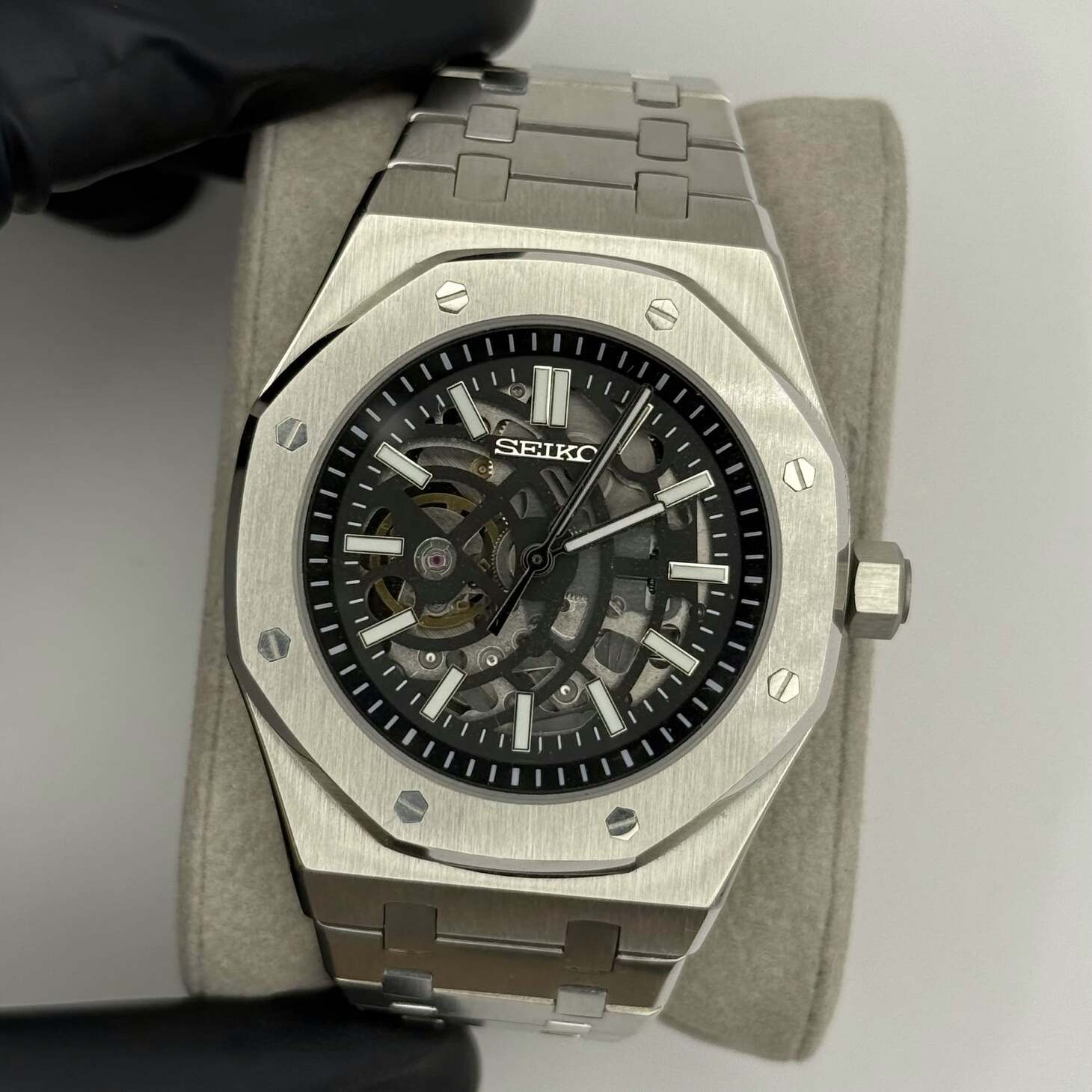 Top view of Seiko Mod Royal Oak Skeleton with brushed steel case, octagonal bezel and open worked dial revealing the automatic movement beneath.